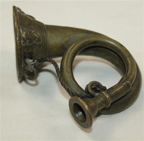 A rare late 17th century German brass miniature natural horn, signed Hieronymus Starck (1640-1693 Nurnberg), overall length 4.75in.